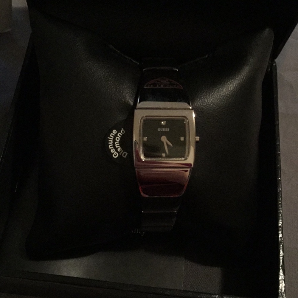 Small silver vintage Guess watch
